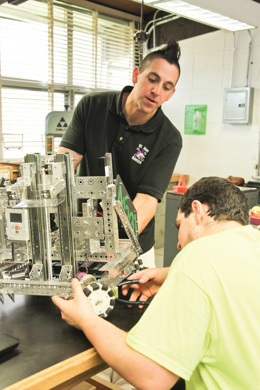 Teacher Ryan Garrity is the head of Mount Hope High School's Robotics and Engineering Club