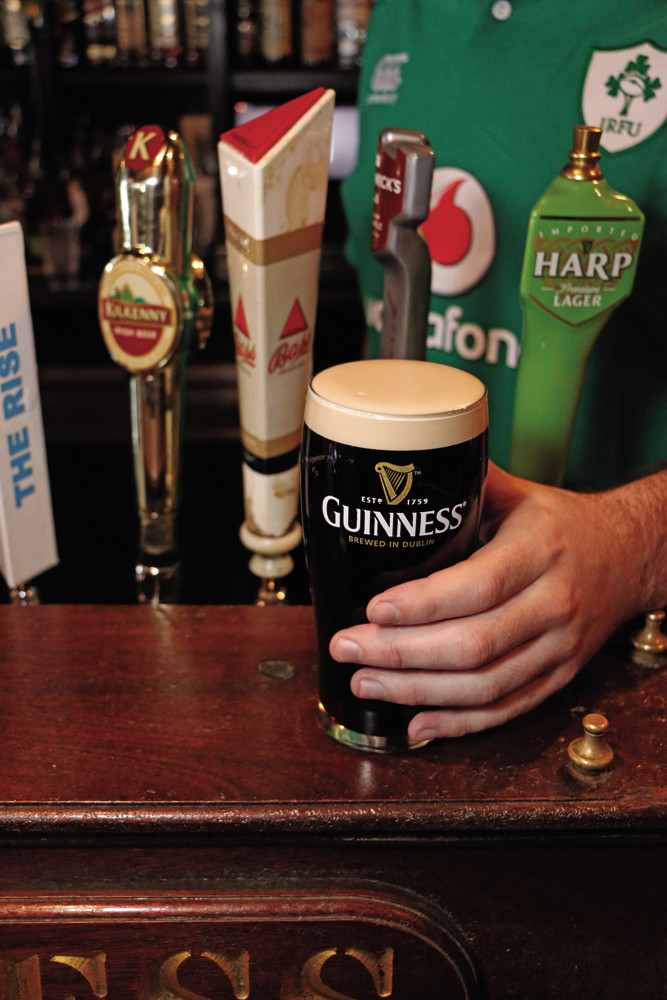 A perfectly poured Guinness – which is harder than it looks – is all part of the traditional Irish atmosphere at The Fastnet Pub