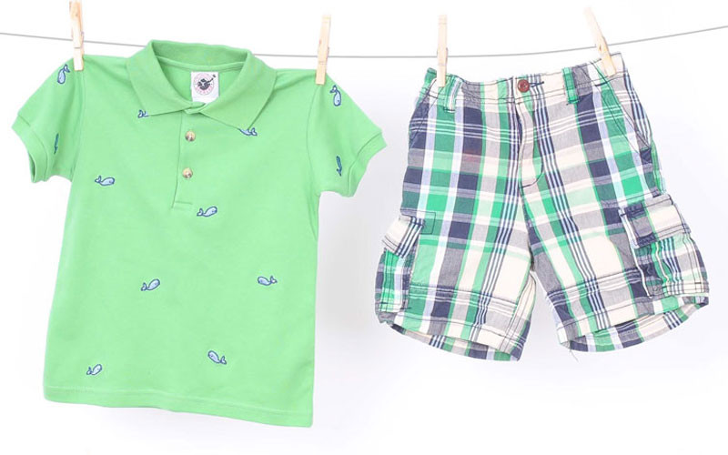 Green rugby with blue whales, $4.99 at The Children’s Orchard; plaid shorts, $6.95 at Luca