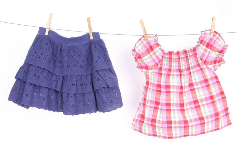 Navy eyelet skirt, $2.99 at Children’s Orchard; plaid blouse, $3.99 at Children’s Orchard
