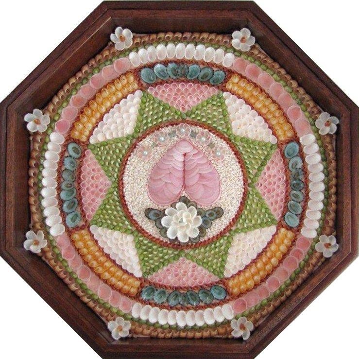 Barbara Chadwick, WestportSailors' Valentines are shell mosaics created in octagonal glass fronted shadow boxes. This valentine echoes the old designs by using a pink woven shell heart topped with a white rose as the central motif and a star surround picked out in green nerites. Barbara Chadwick created this artwork in preparation for her upcoming one-woman show in August at the Sturgis Library in Barnstable, MA. Website