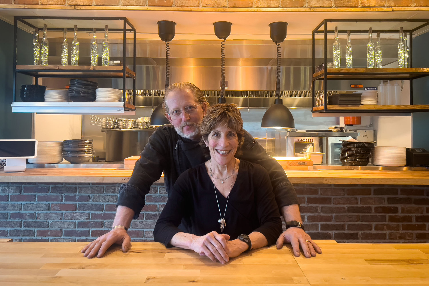 Marc Alexander and Marla Romash recently opened Our Table in Jamestown