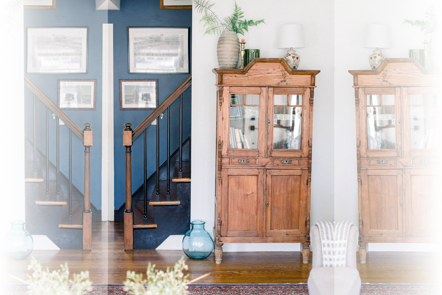 Gray Lake by Benjamin Moore provides nice contrast to the darker shade – a custom mix with a Hale Navy foundation – of the stairway